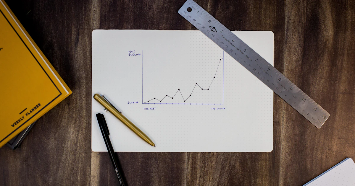 Person reviewing market charts