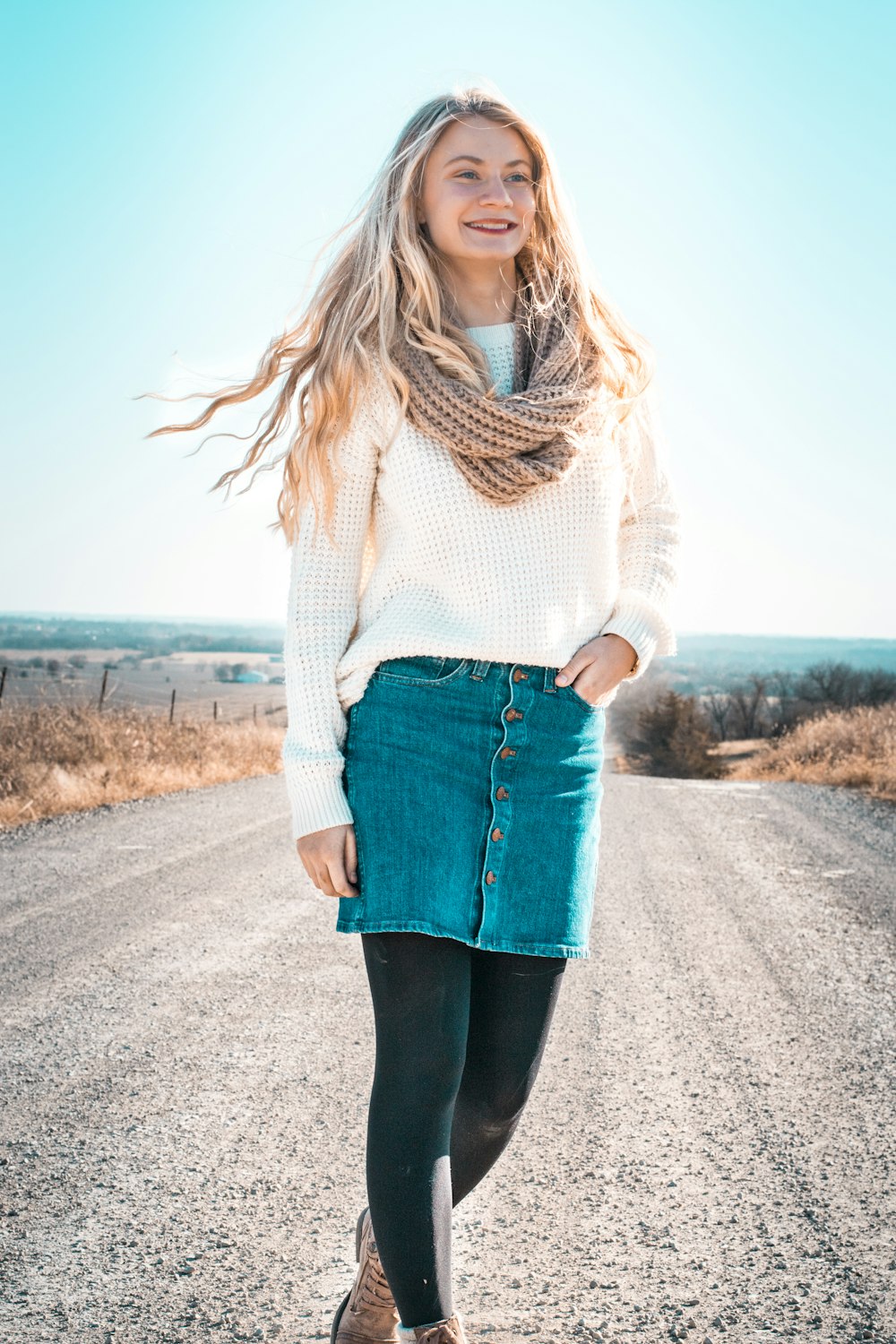 woman standing on road