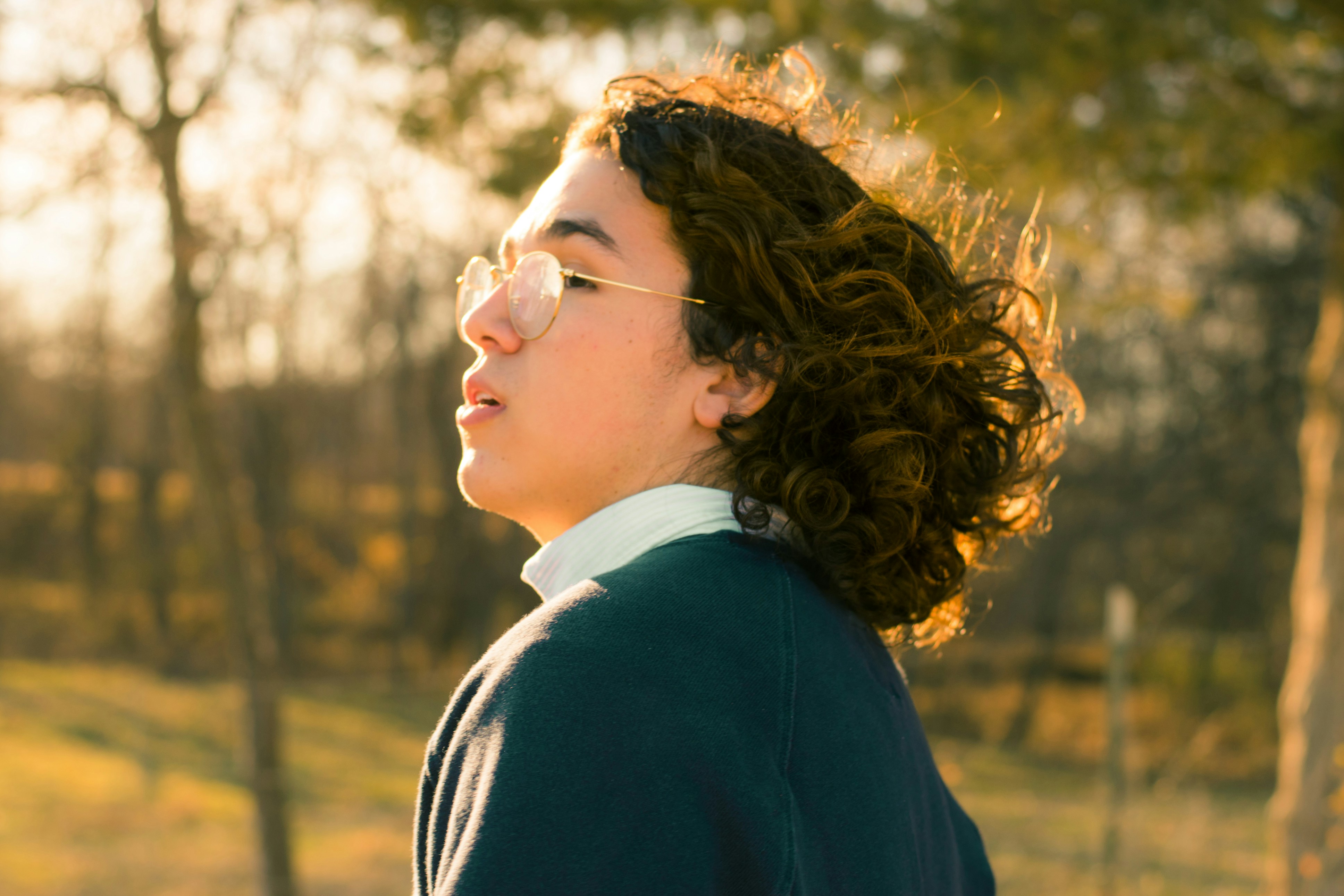 woman wearing black and white collared top, David’s vibe