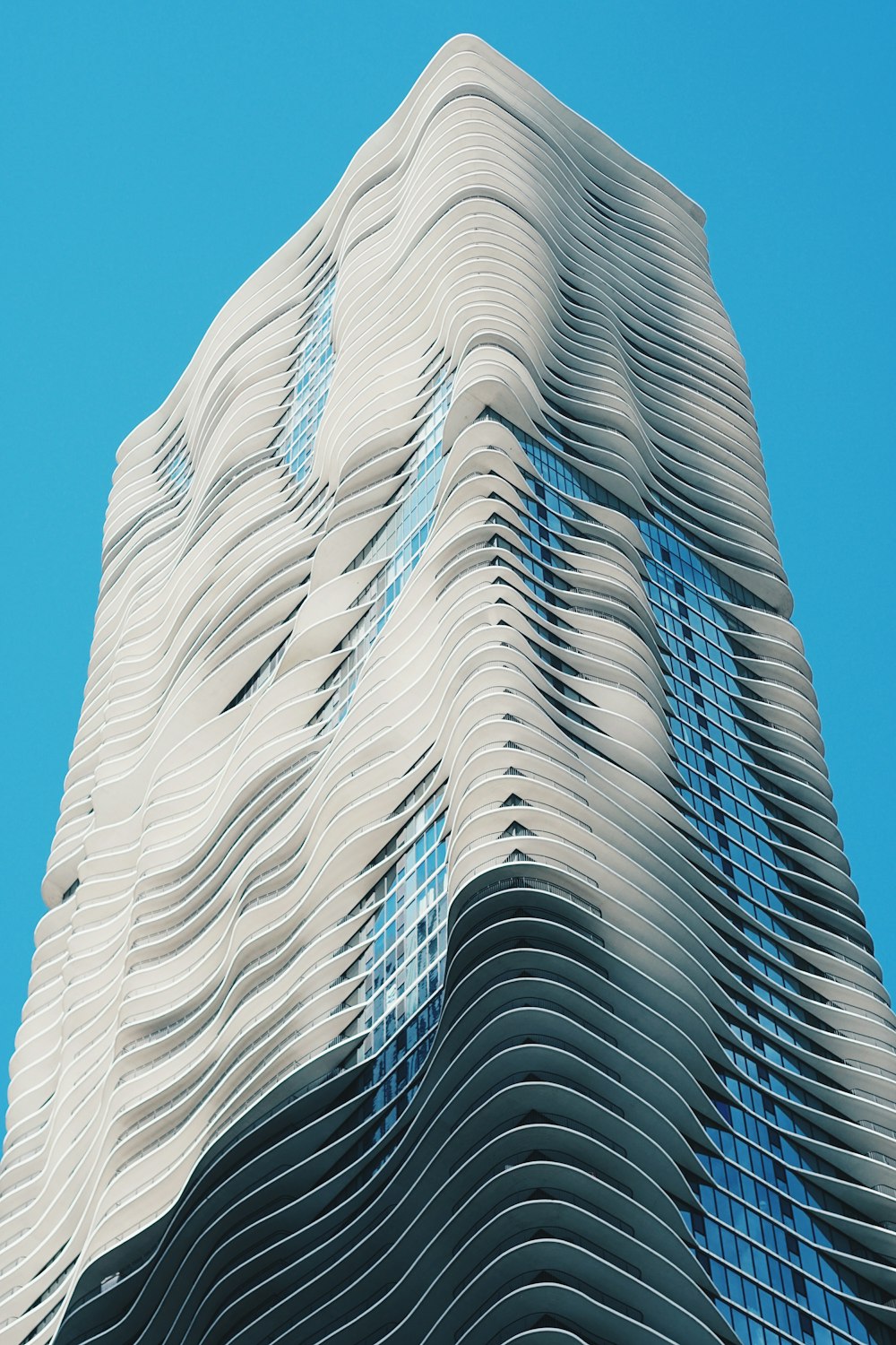 low angle photography of white high rise building