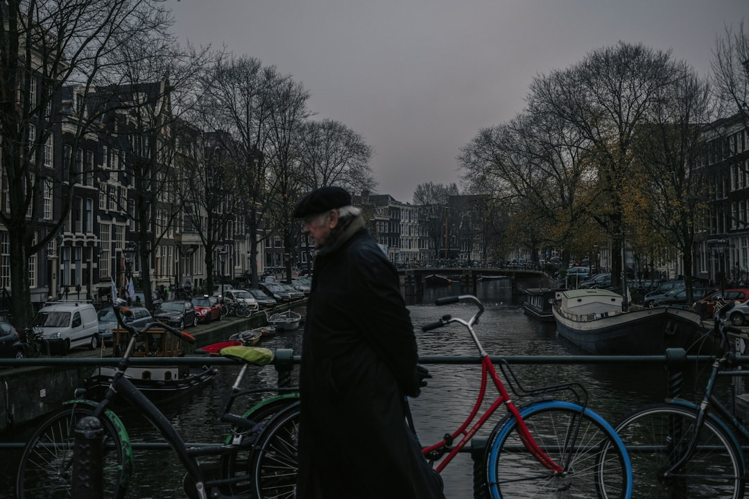 person near parked bikes