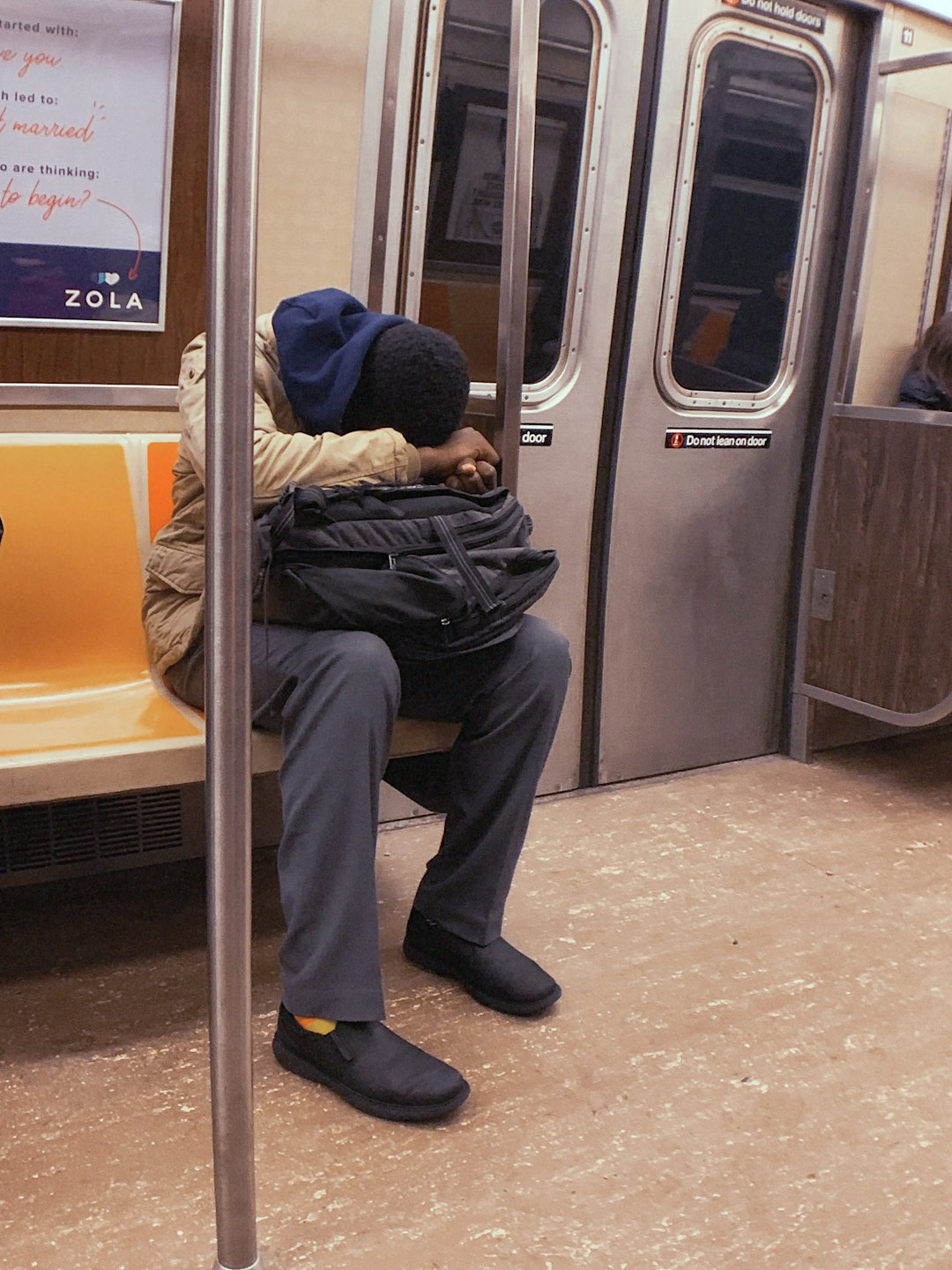 person sitting on train's chair