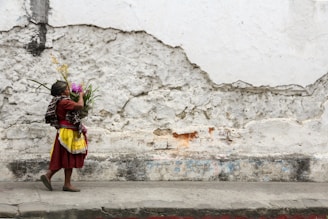 woman carrying flowers