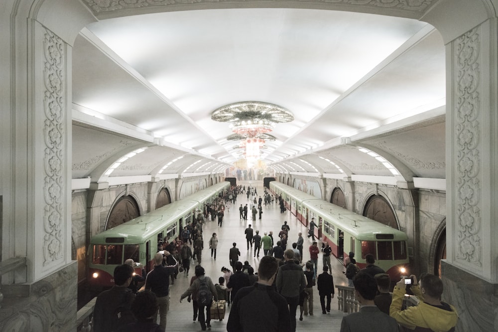 group of people riding to the train