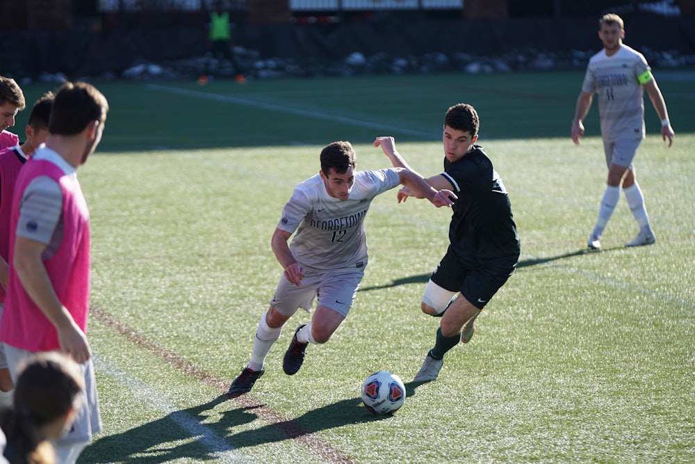 man playing soccer on the field