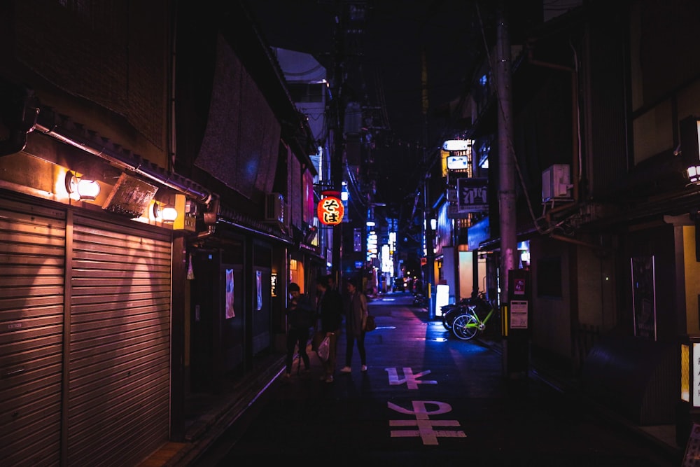 people at the streets of the city during night