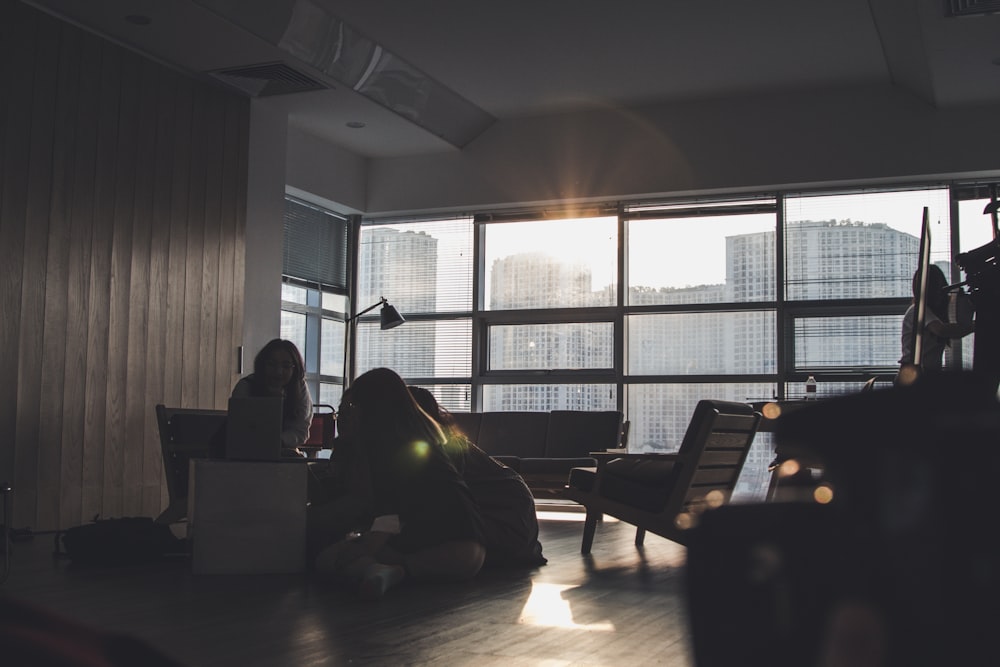 silhouette photography of people inside living room