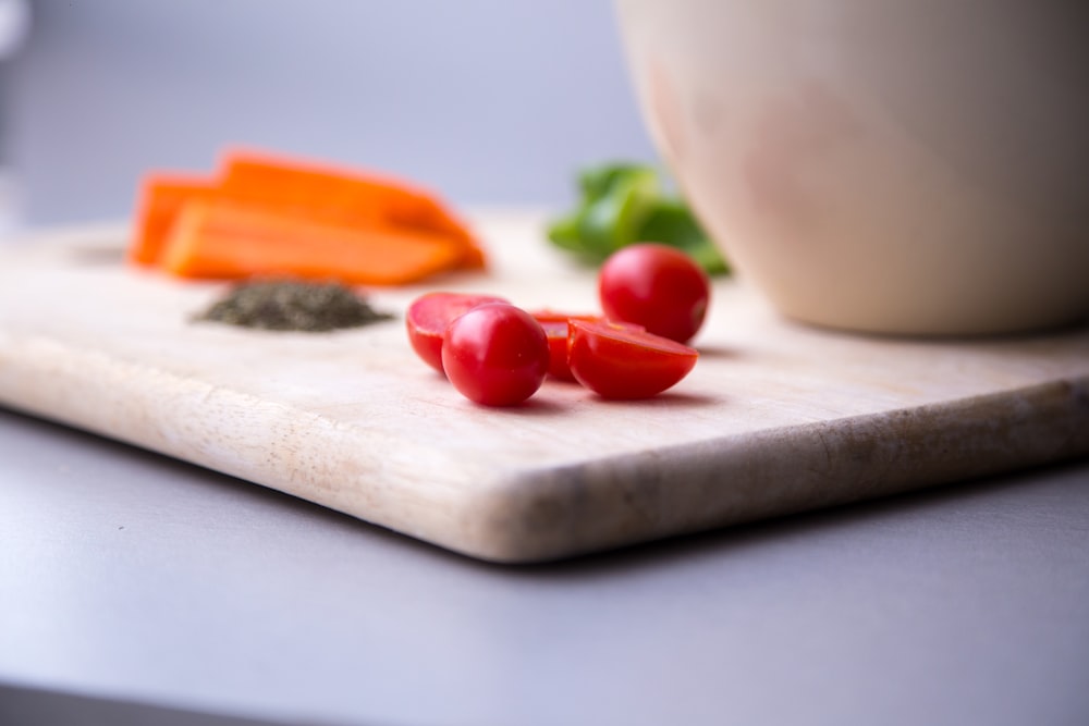 sliced berries on chopping board