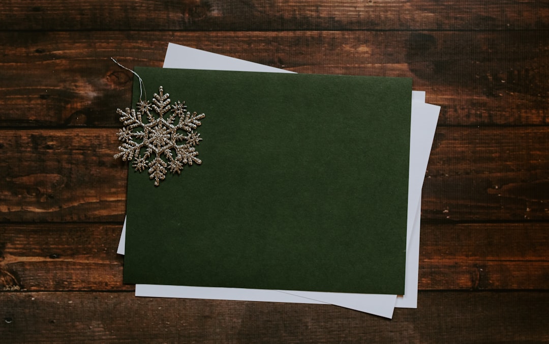 gray snowflake on green paper