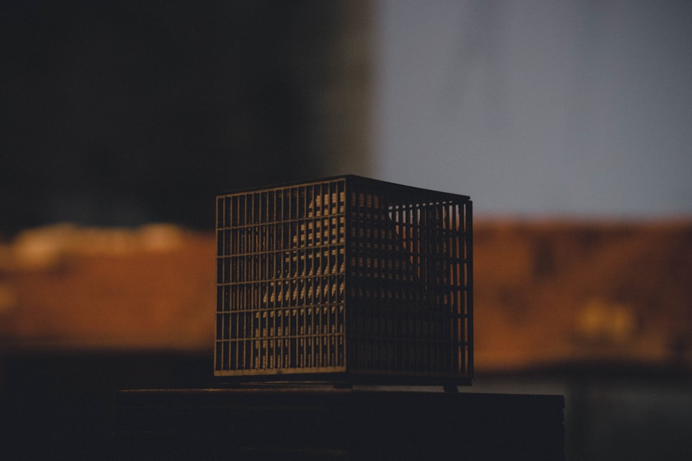 black metal cube on table