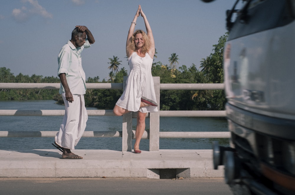 man and woman by the road