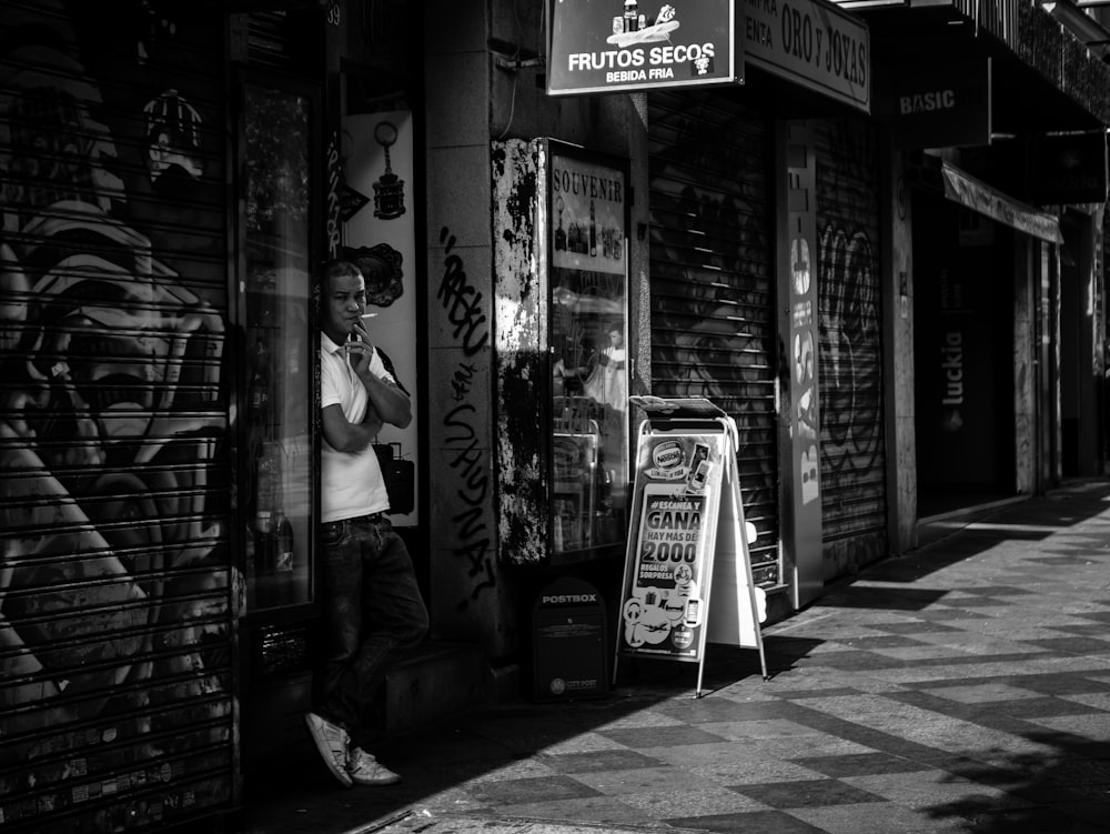 smoking man on side street