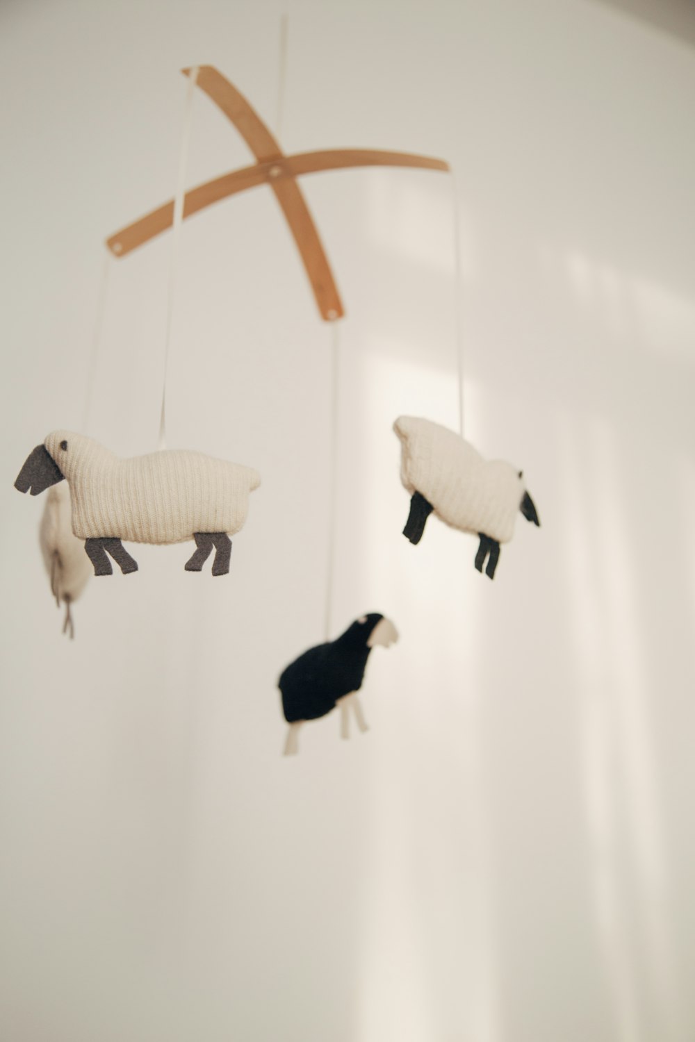 white sheep baby mobile