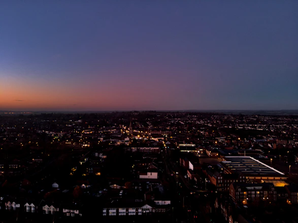 A panoramic view of a global cityscape at dusk, symbolizing international financial connections.