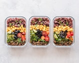 High-resolution photo of a colorful, balanced meal kit ready to be packed.