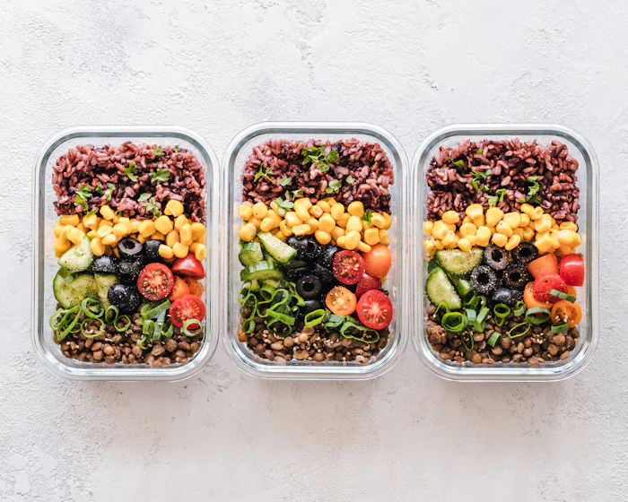Containers of whole grains, vegetables and pulses