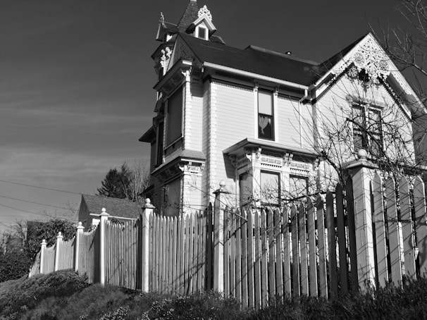 Before and after shots of a renovated Victorian property showcasing restored details.