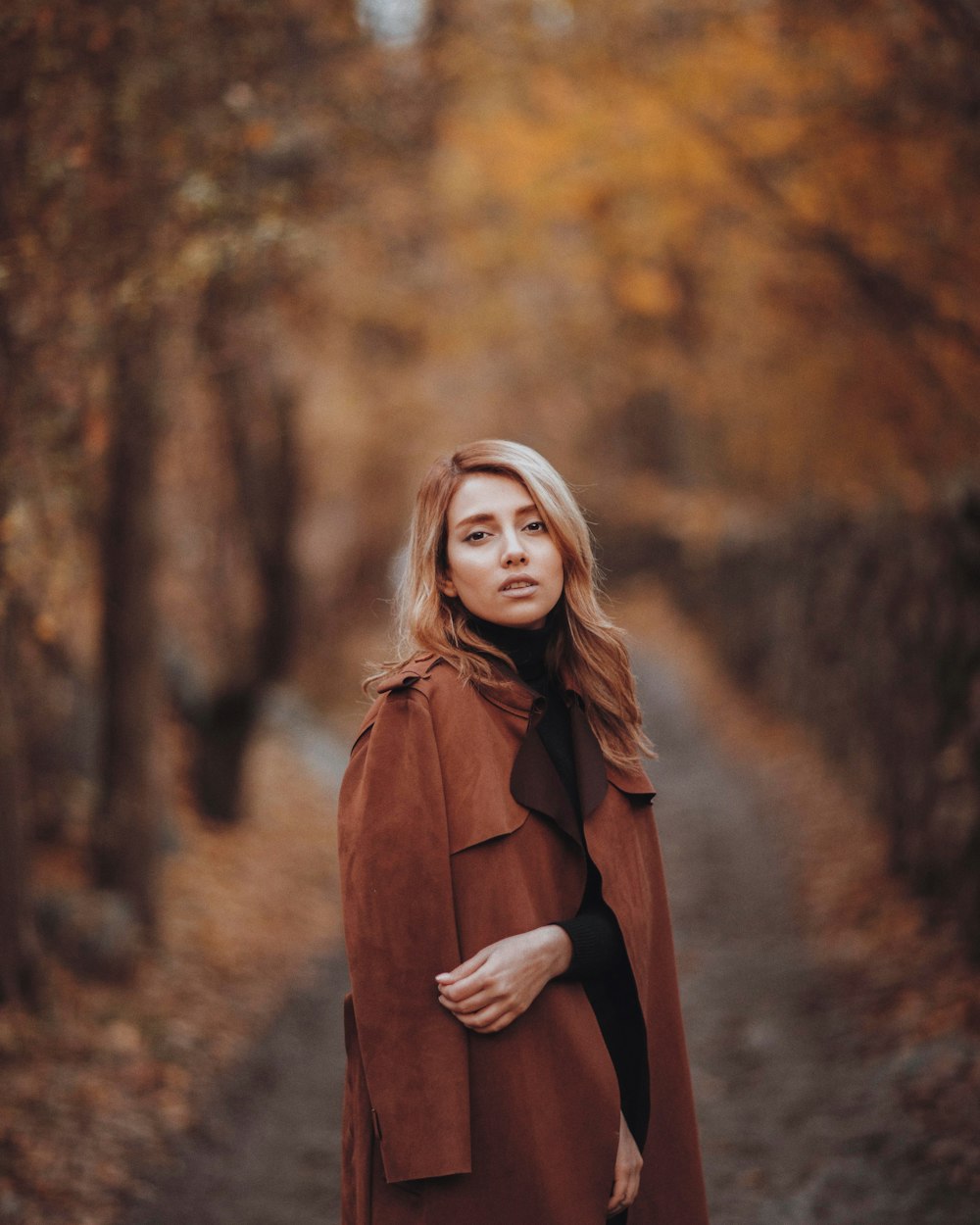 selective focus photography of woman wearing coat