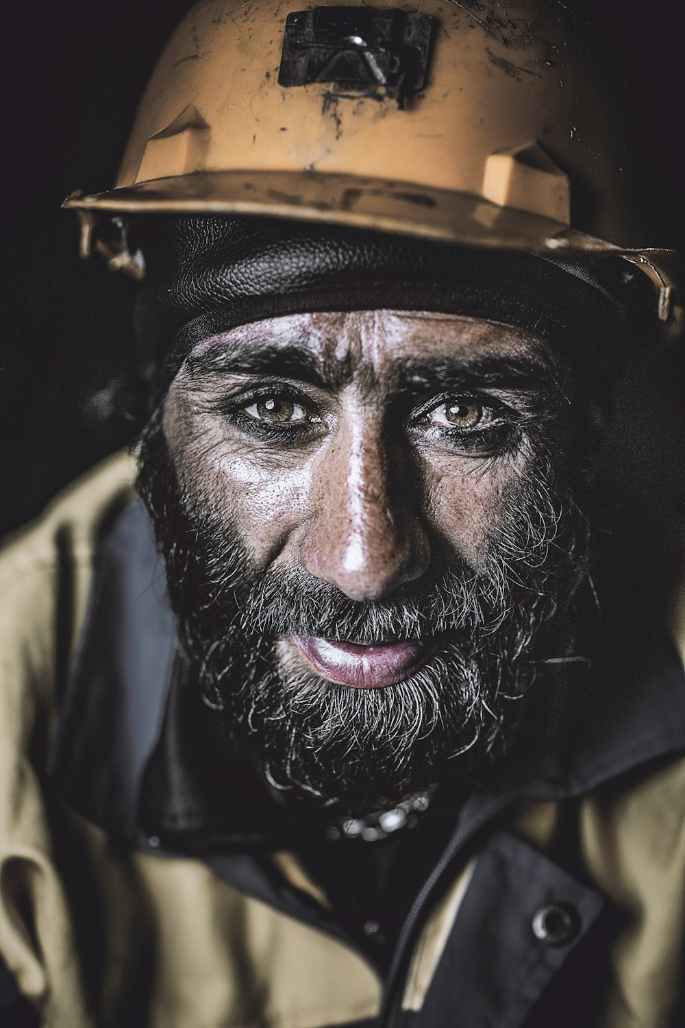 man wearing yellow hard hat