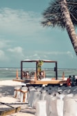 gazebo and chairs on shore