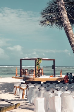 gazebo and chairs on shore