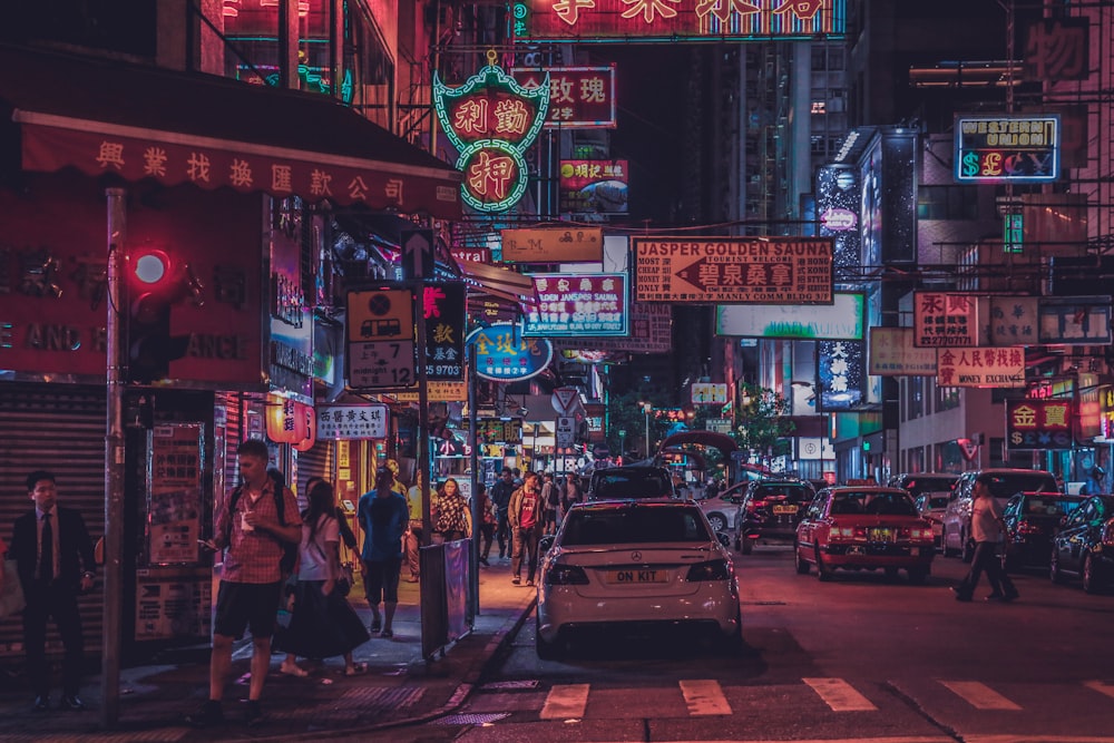 vehicle parked beside building at night