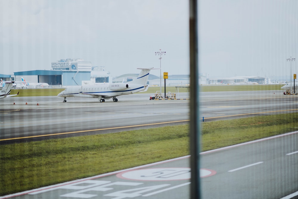 plane parked near building