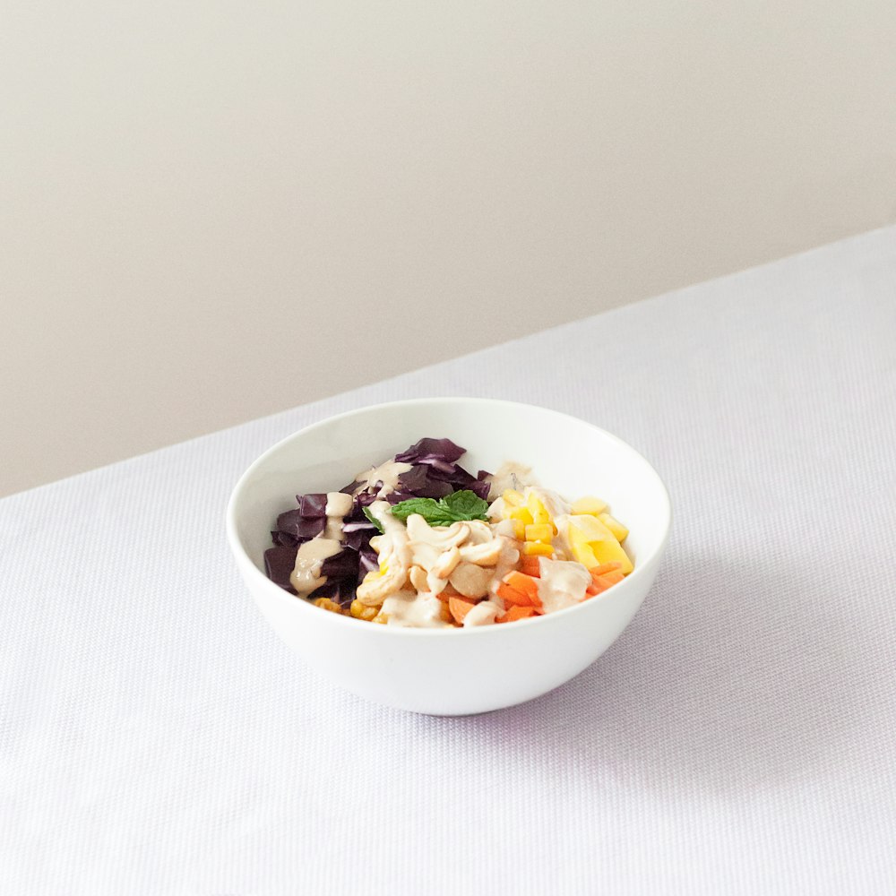 white ceramic bowl on white surface