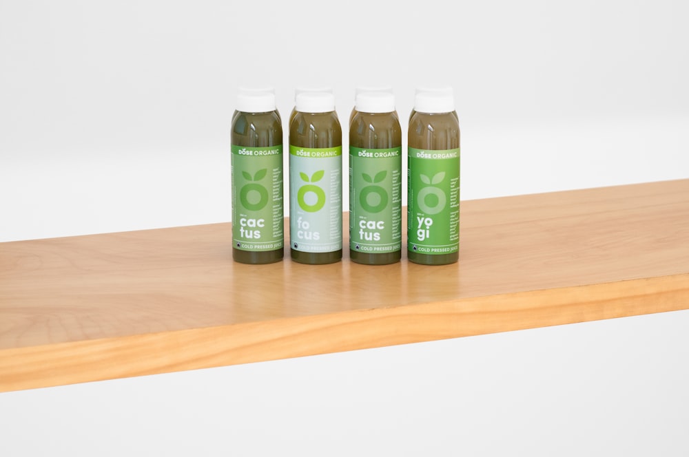 Cac Tus Plastic Bottle On Yellow Surface Photo Free Bottle Image On Unsplash