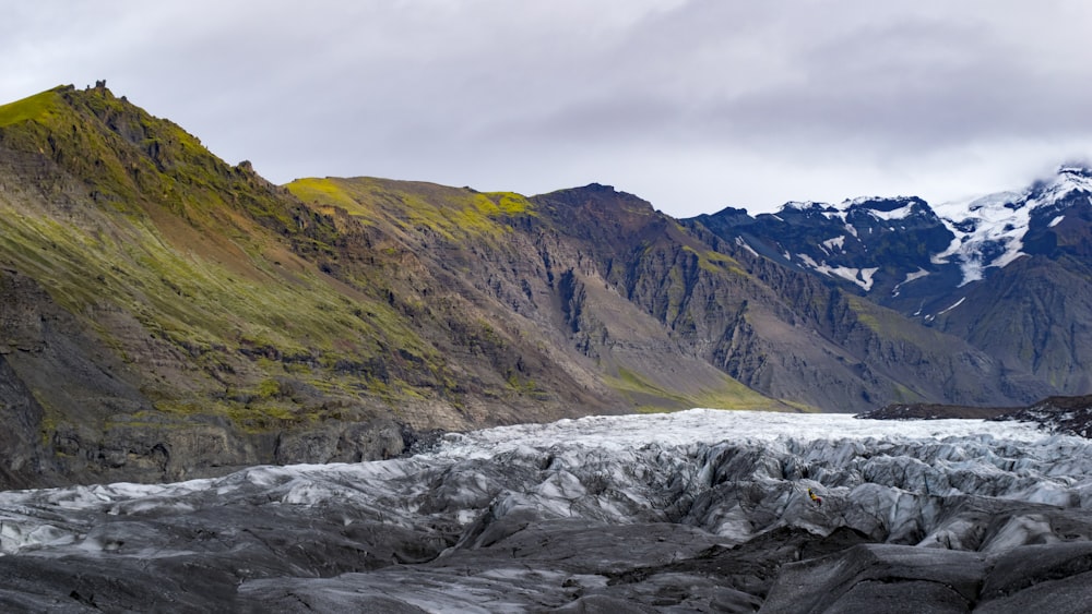 mountain near river during daytime