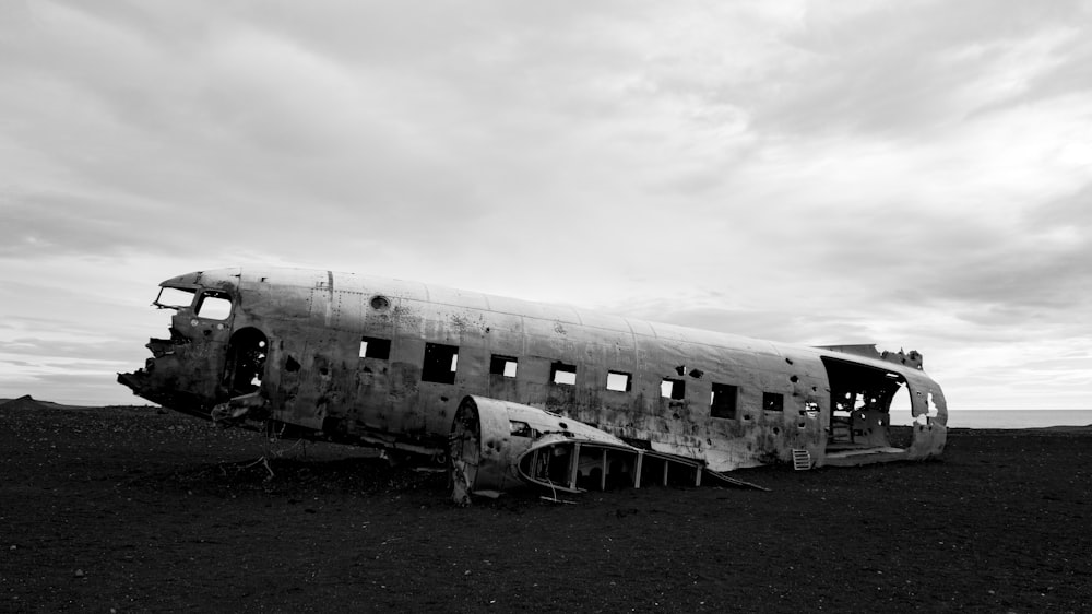 ruin white plane under grey clouds