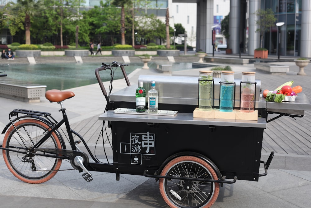 selective focus photography of black and gray pedal cart