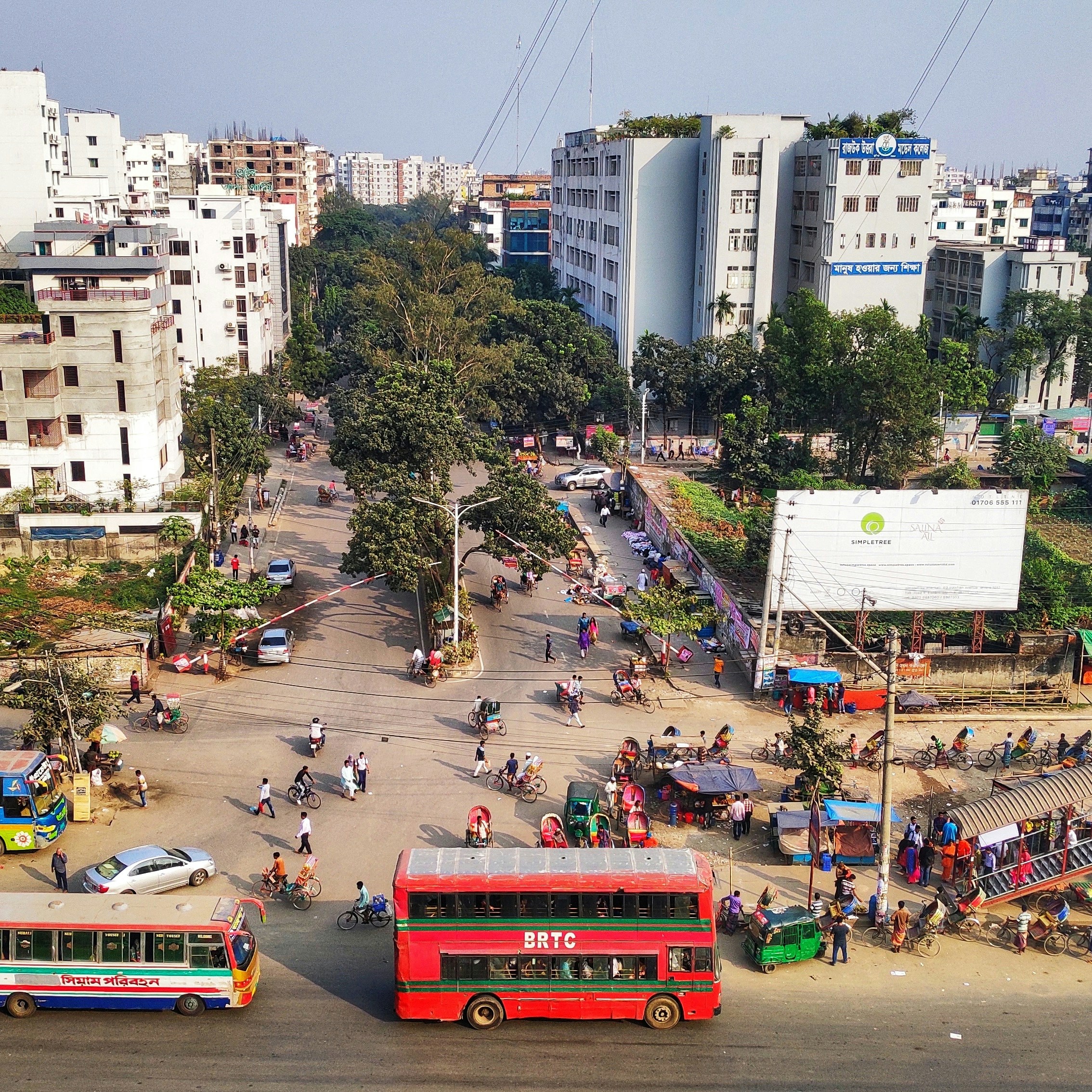 aerial photography of red bus on road