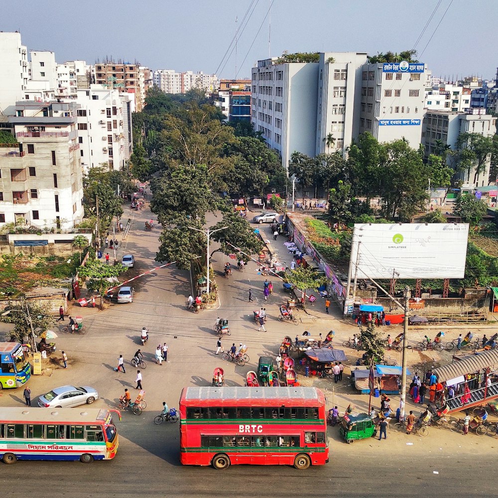 aerial photography of red bus on road