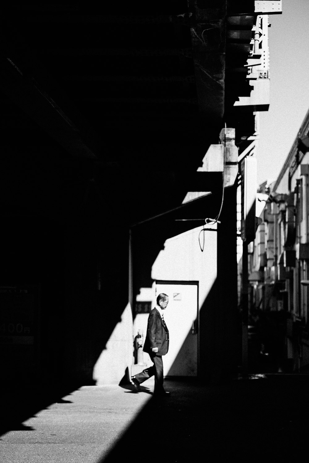 man standing beside door