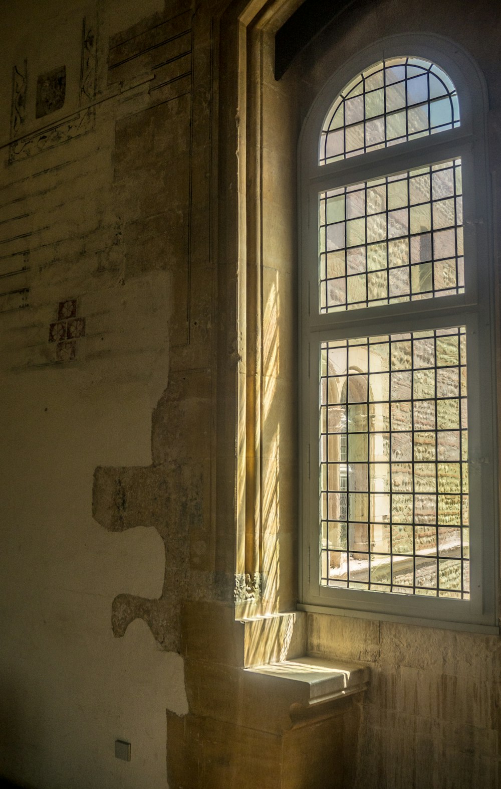 brown wooden framed glass window