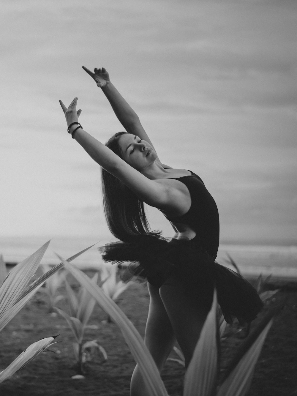 grayscale photography of dancing woman