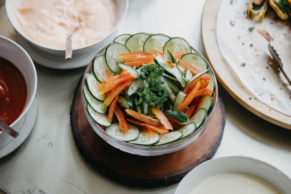 cucumber and tomato salad dish on table