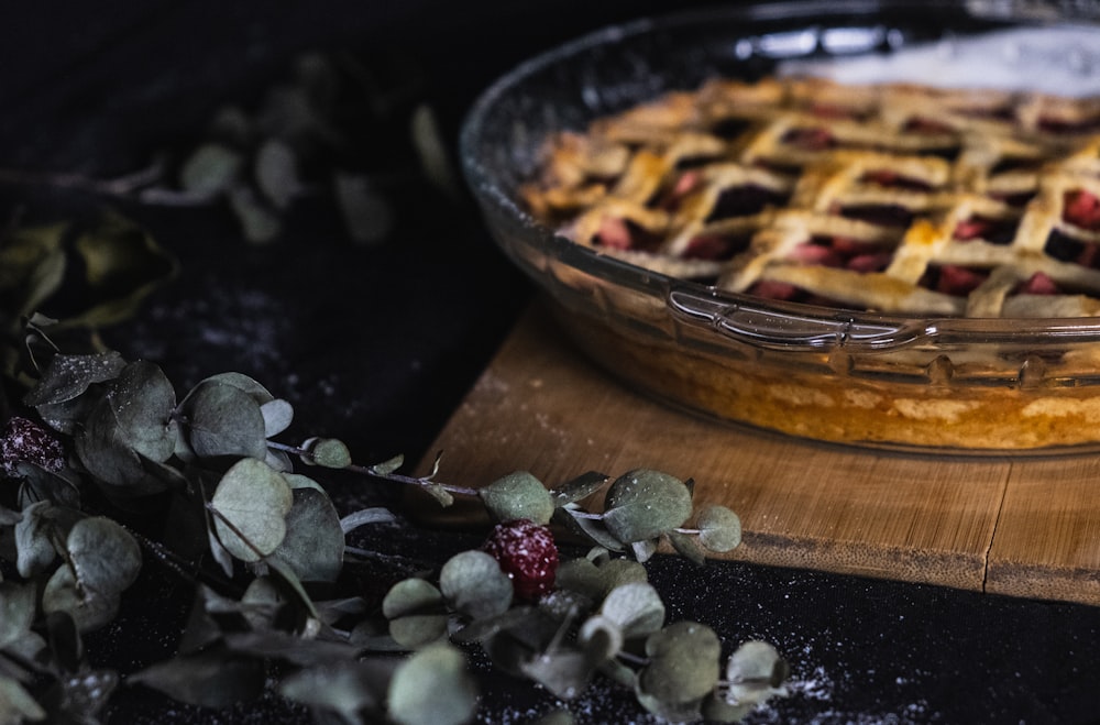 baked pie on clear glass plate