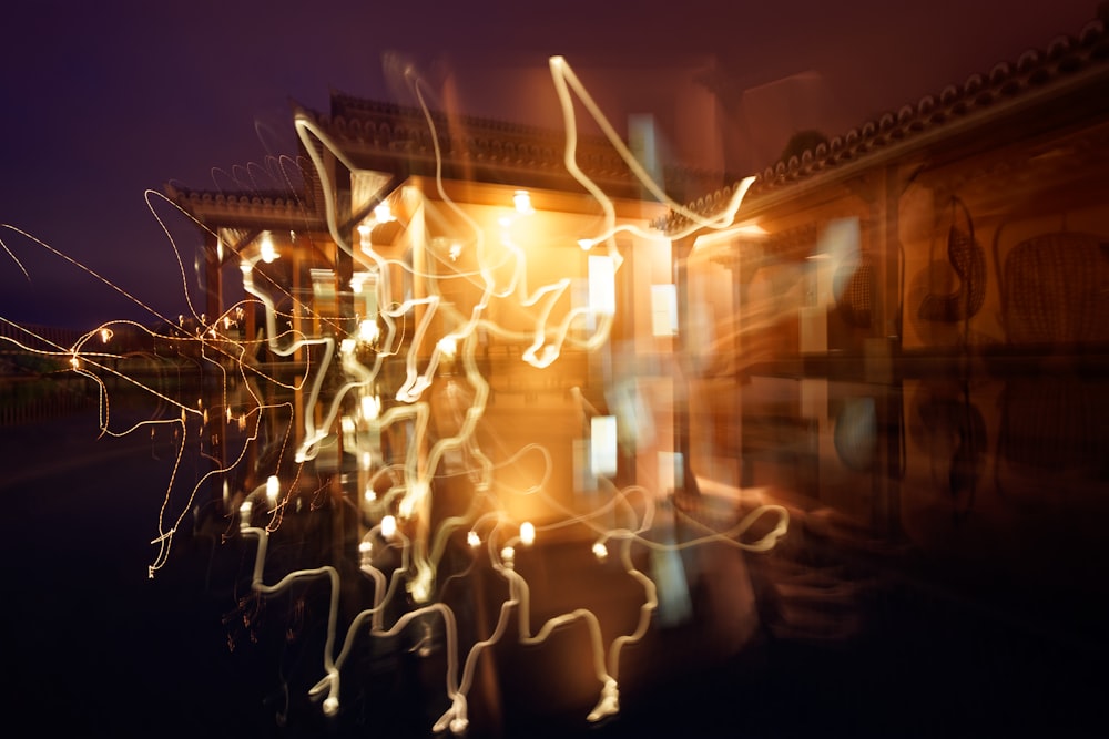 lights near 2-story building during night