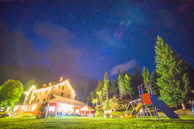A warm, inviting home with children playing happily in the yard.