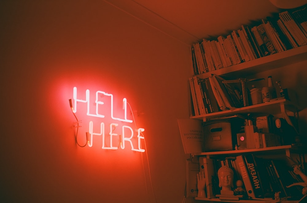 hell here neon signage