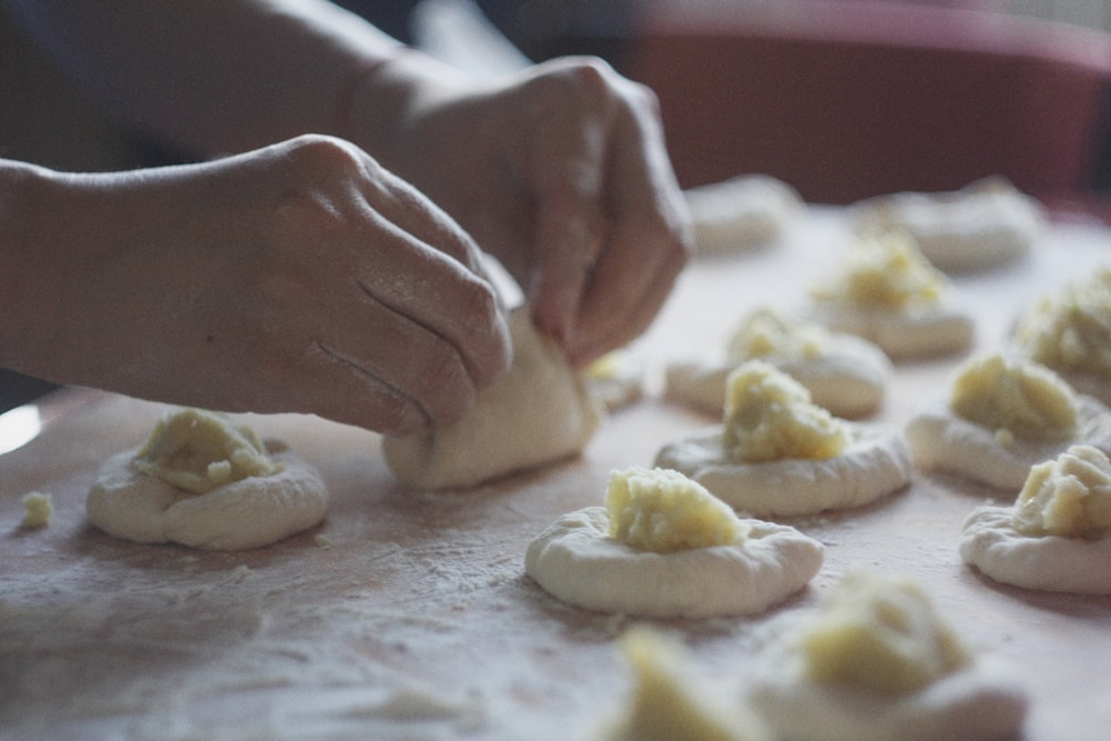 person making pastries