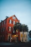 orange building near trees