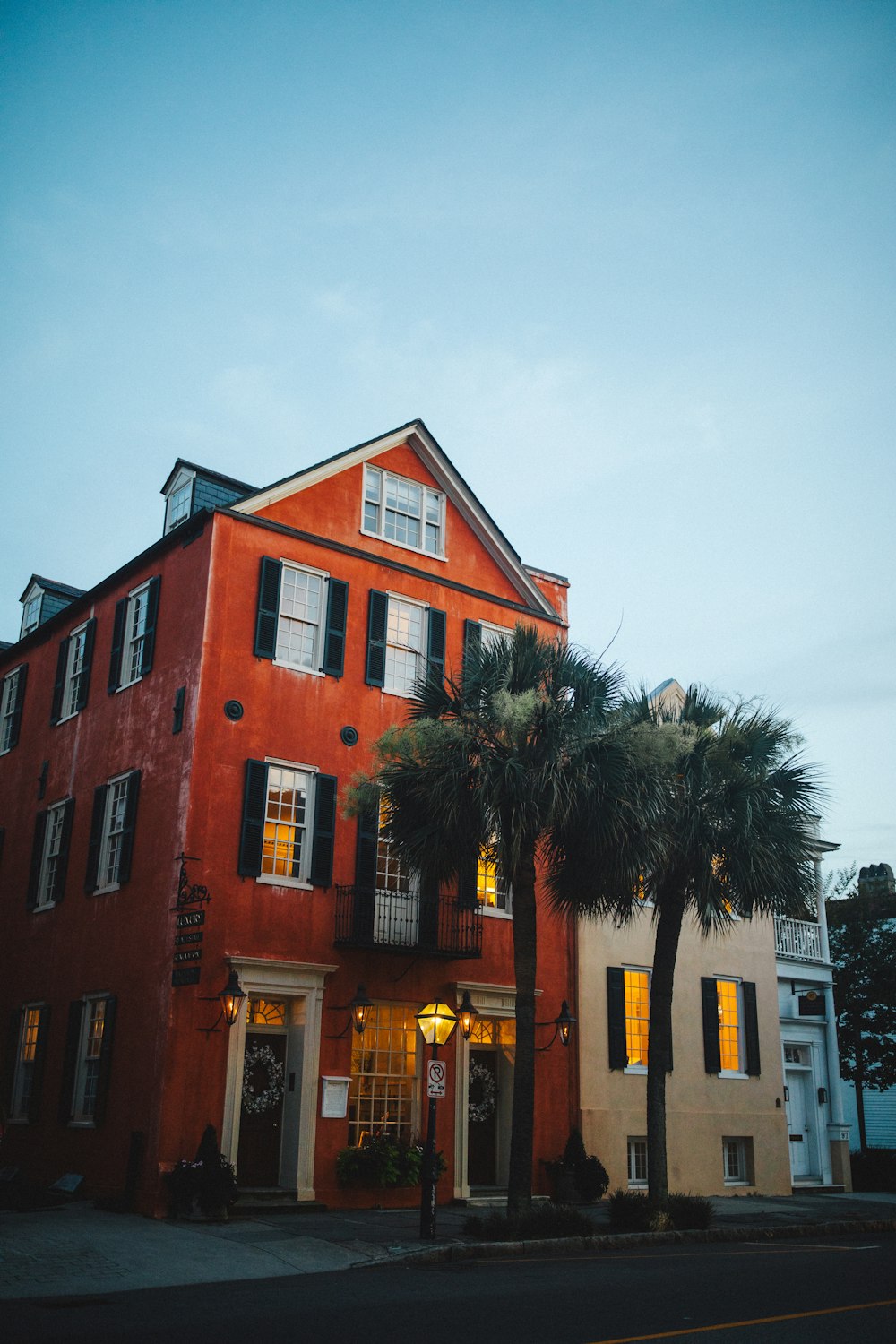 orange building near trees