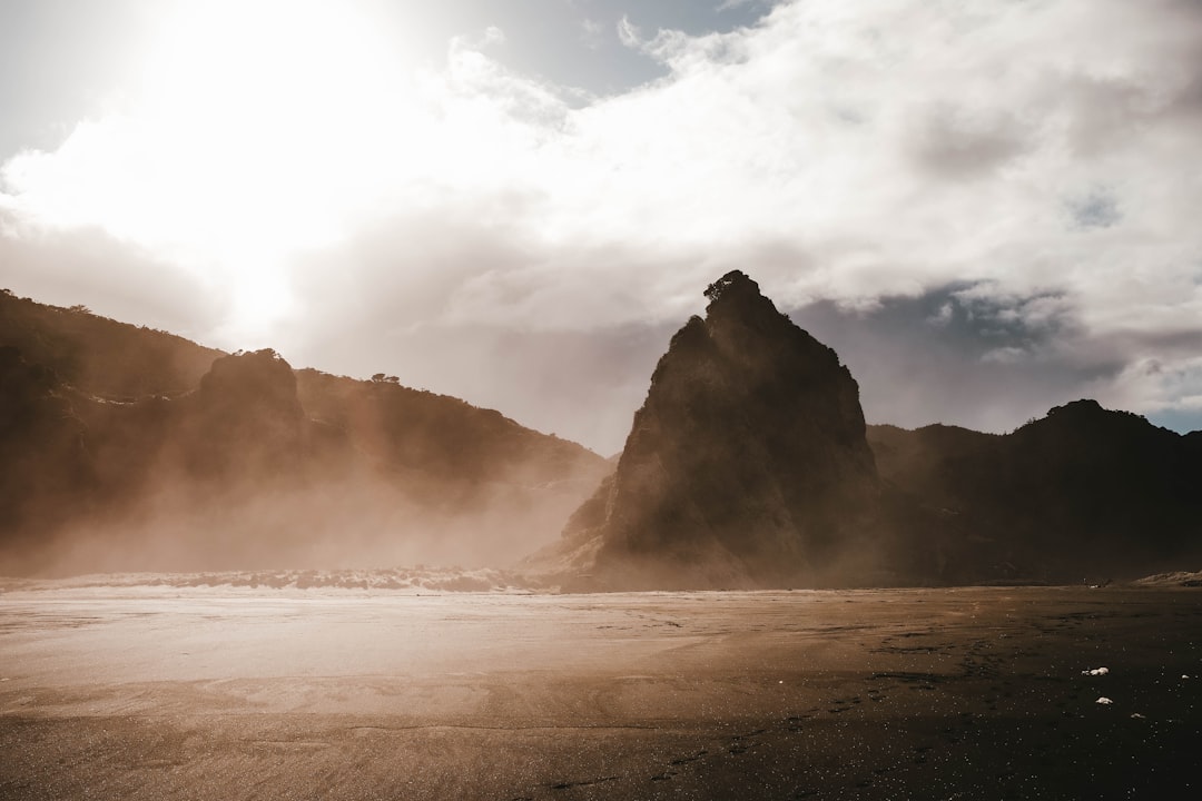 photo of fog covered mountains