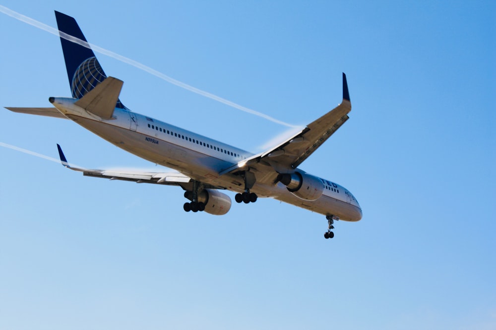 white airplane during daytime