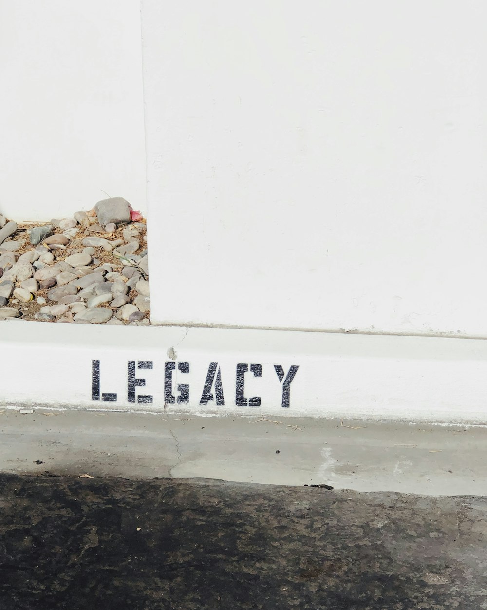 white and gray Legacy graffiti