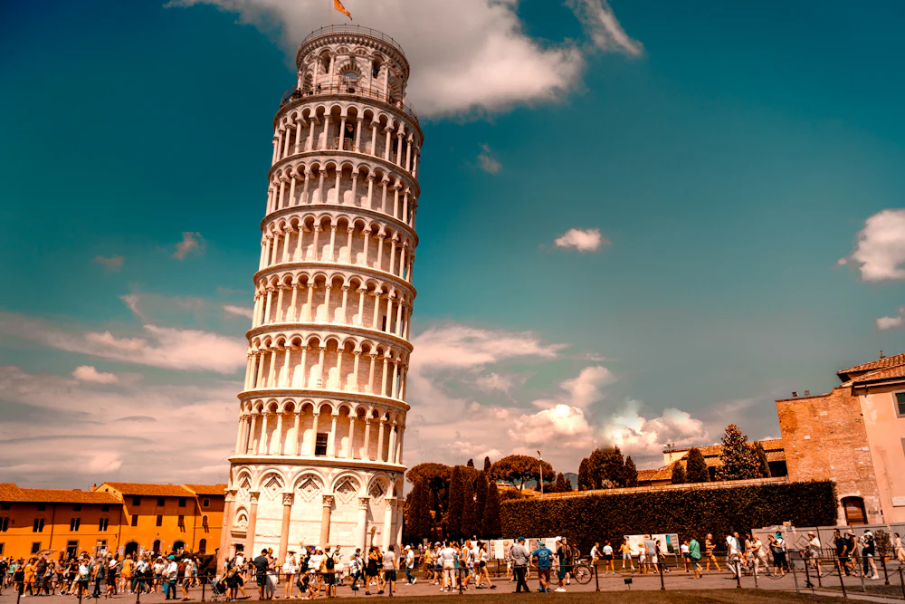 The Leaning Tower of Pisa under a clear sky