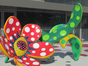 Close-up of vibrant pipe cleaners twisted into a blooming flower sculpture